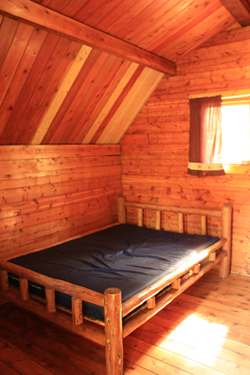double bed inside cabin
